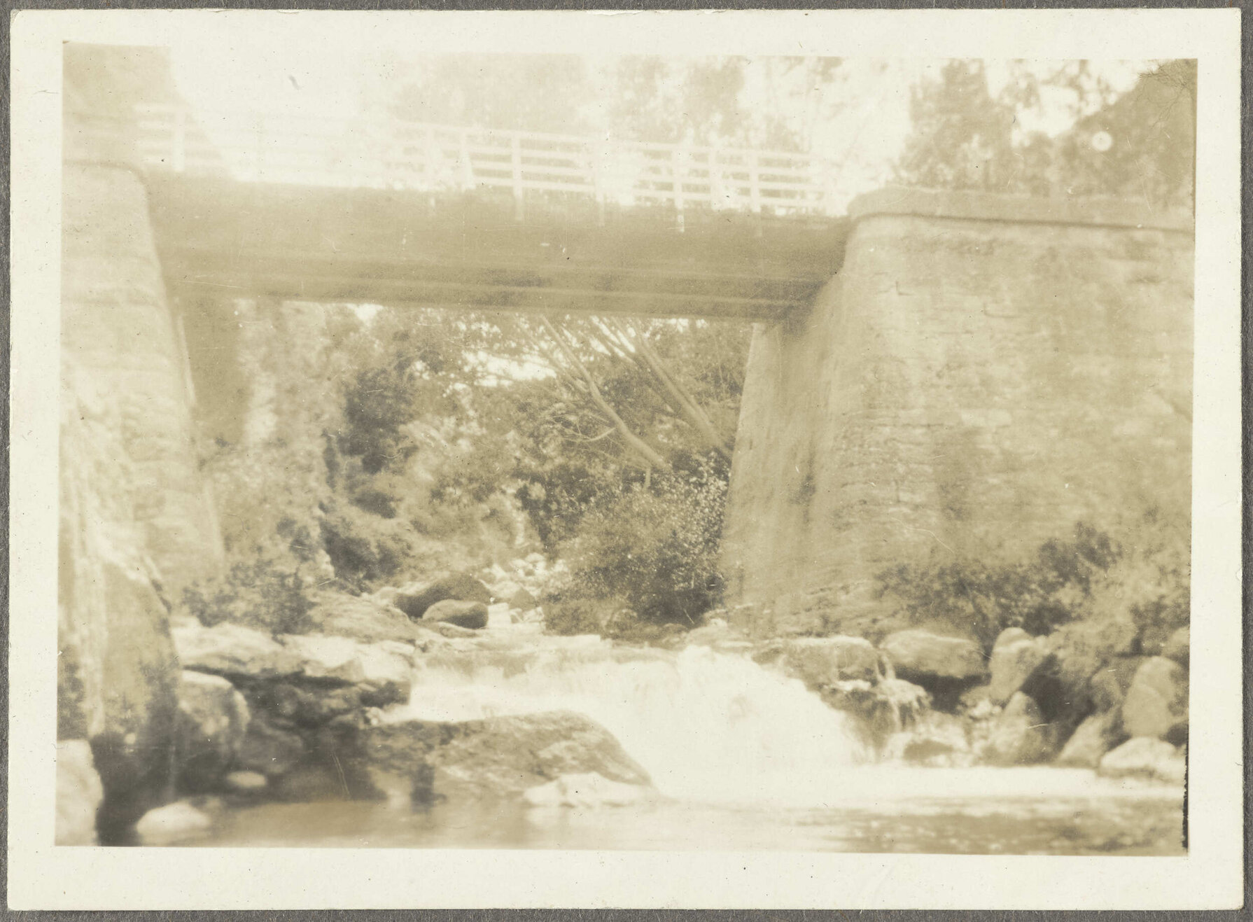River flowing under bridge