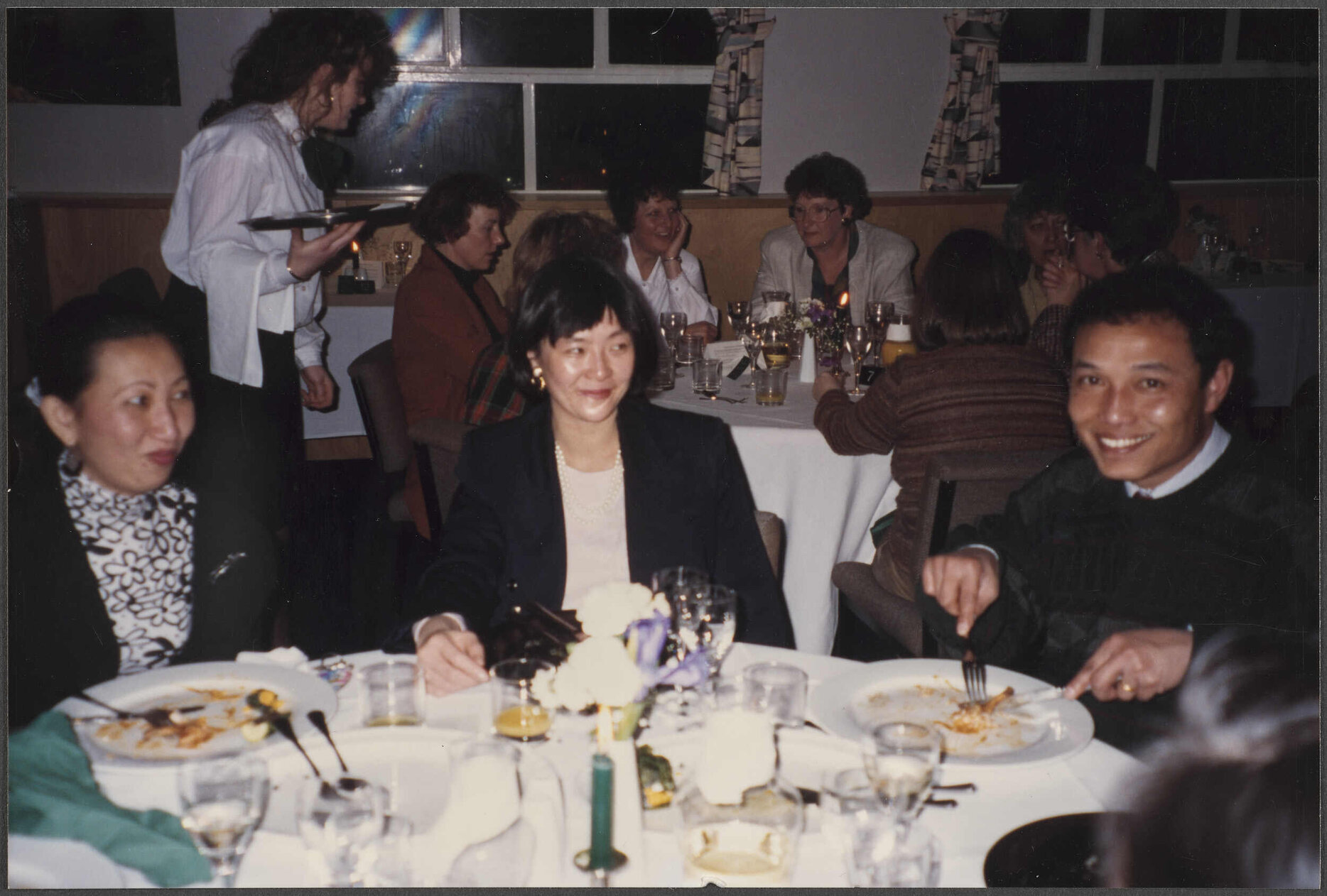Yek Hong Lok, Jean Lai, and Pachasith Prum at the Otago Polytechnic restaurant