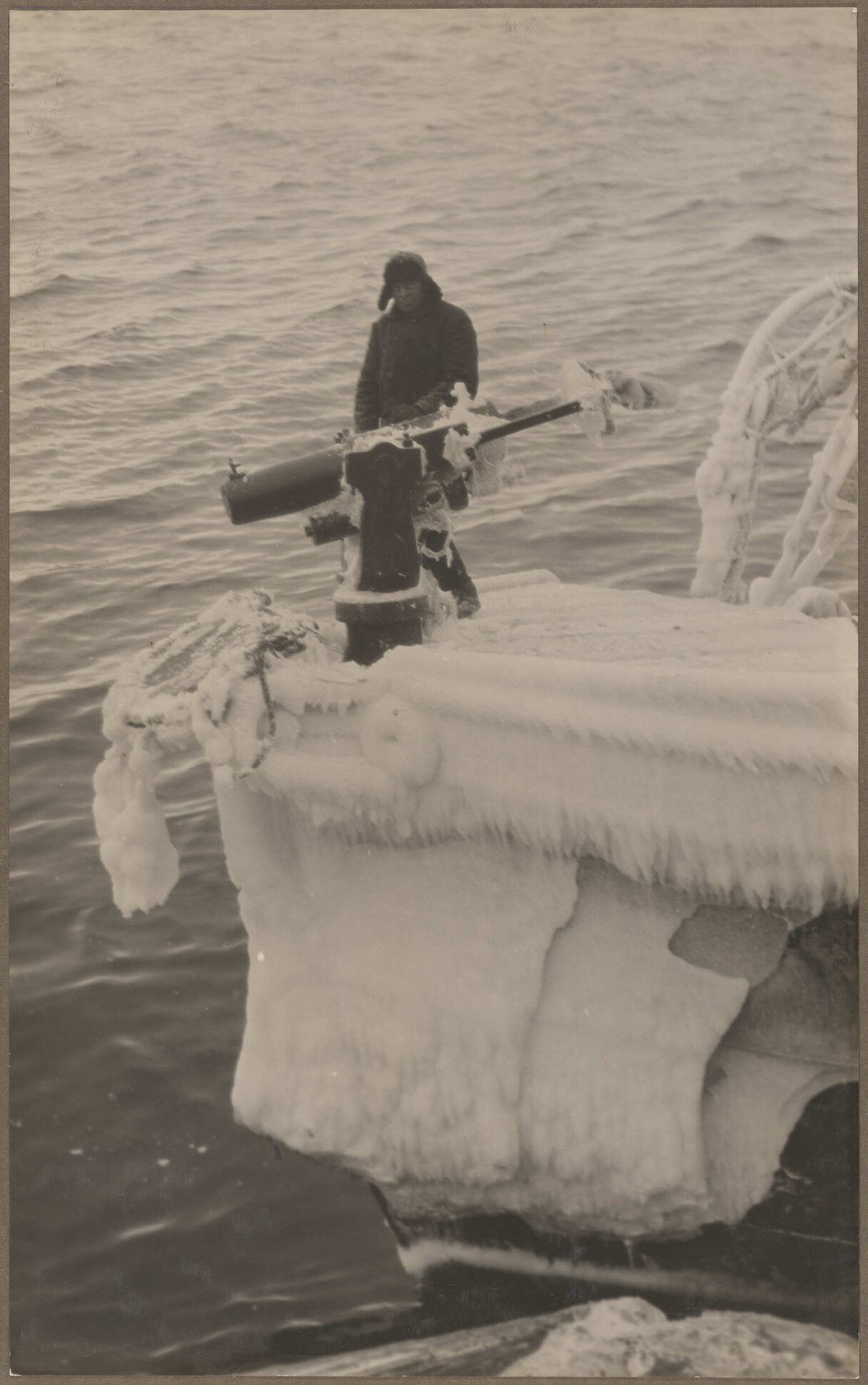 Man standing on gun platform