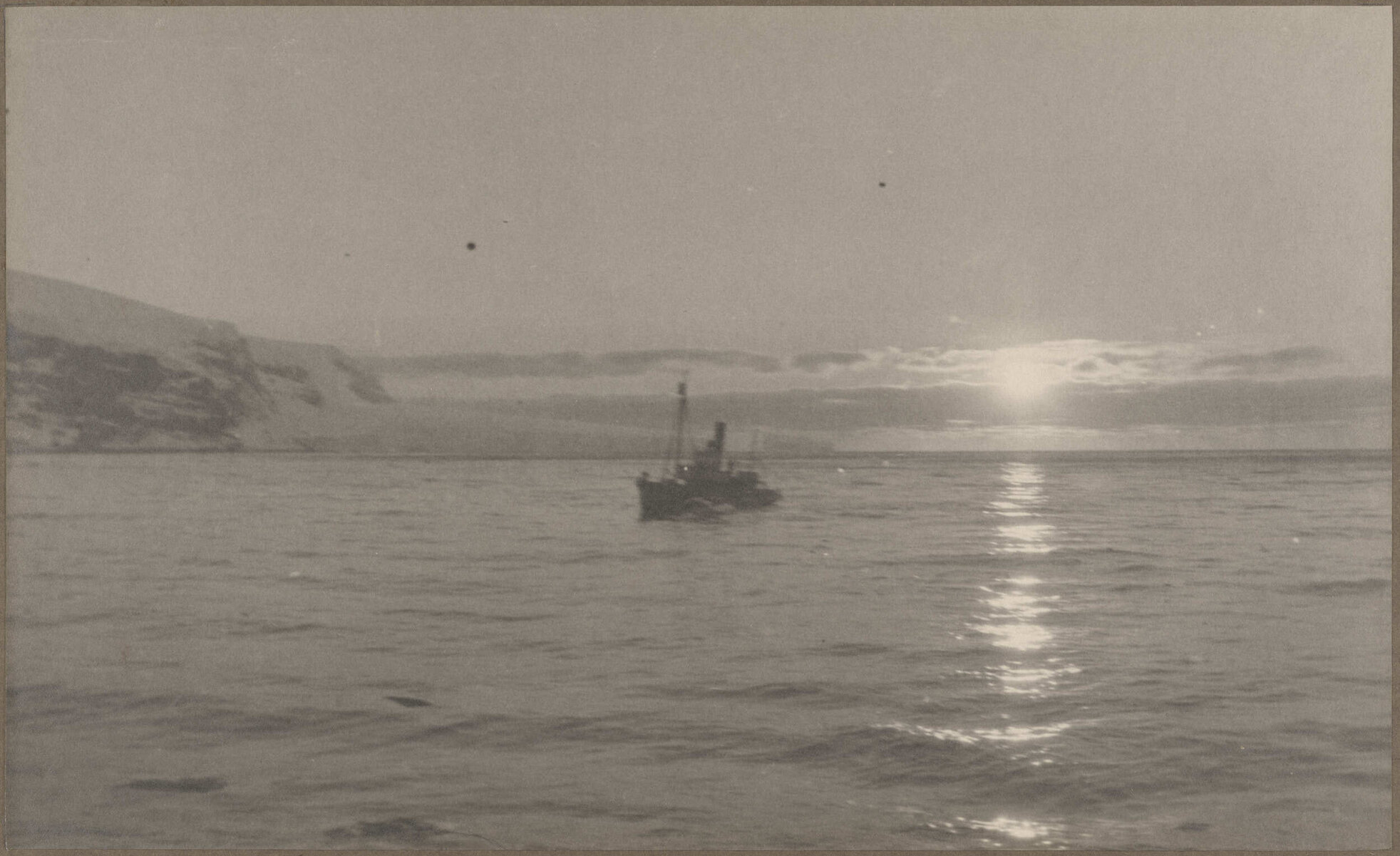Whale-catcher at sunset
