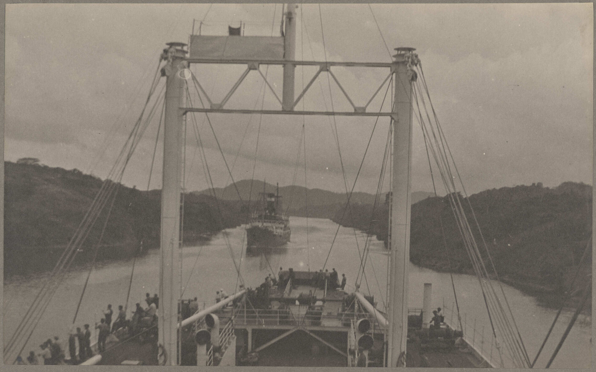 Two ships navigating a river