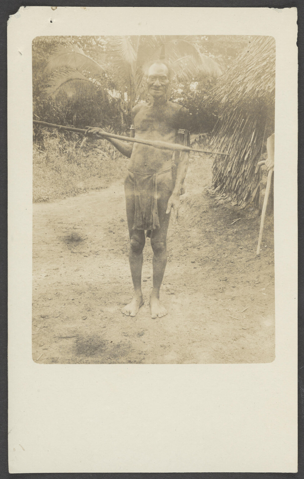 Elderly man with spear