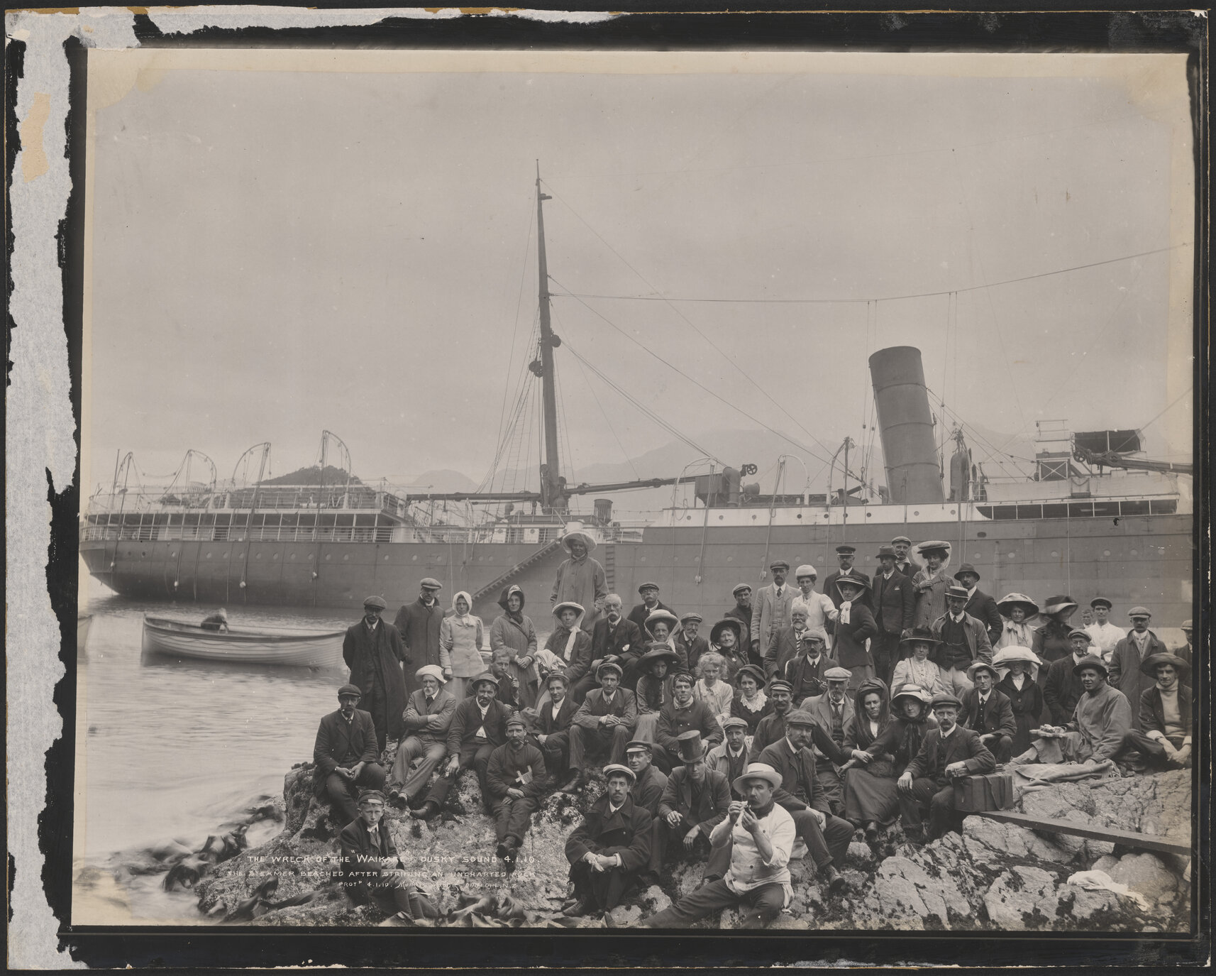 Wreck of the "Waikare", Dusky Sound : The steamer beached after striking an uncharted rock