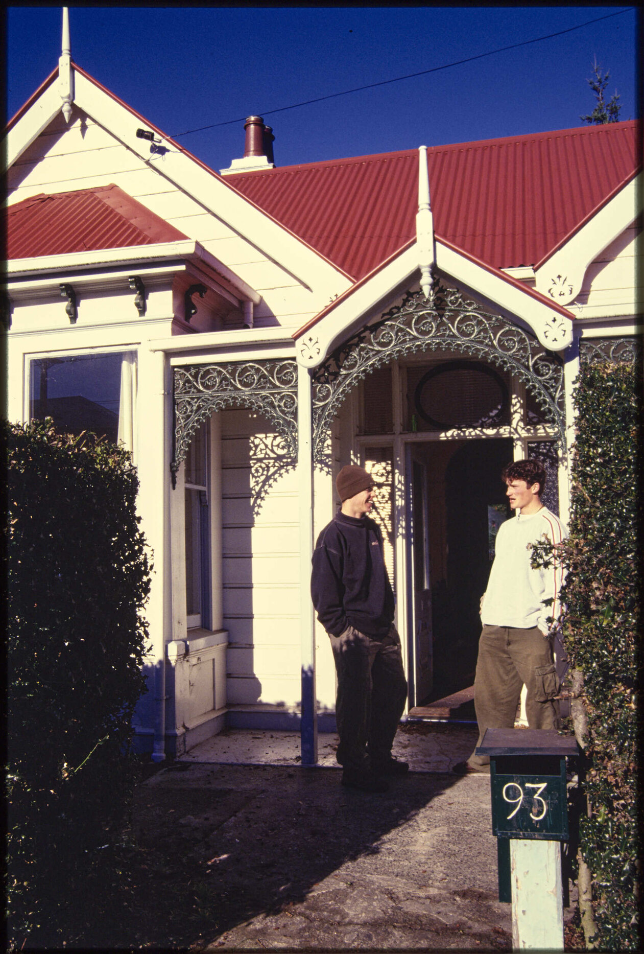 Students in front of flat on Dundas Street