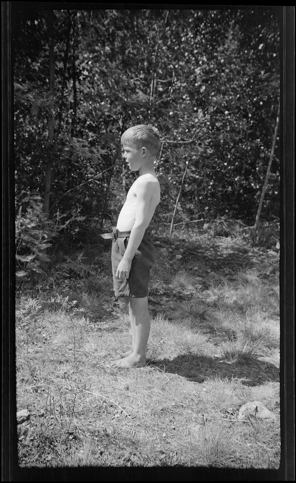 Child standing side on