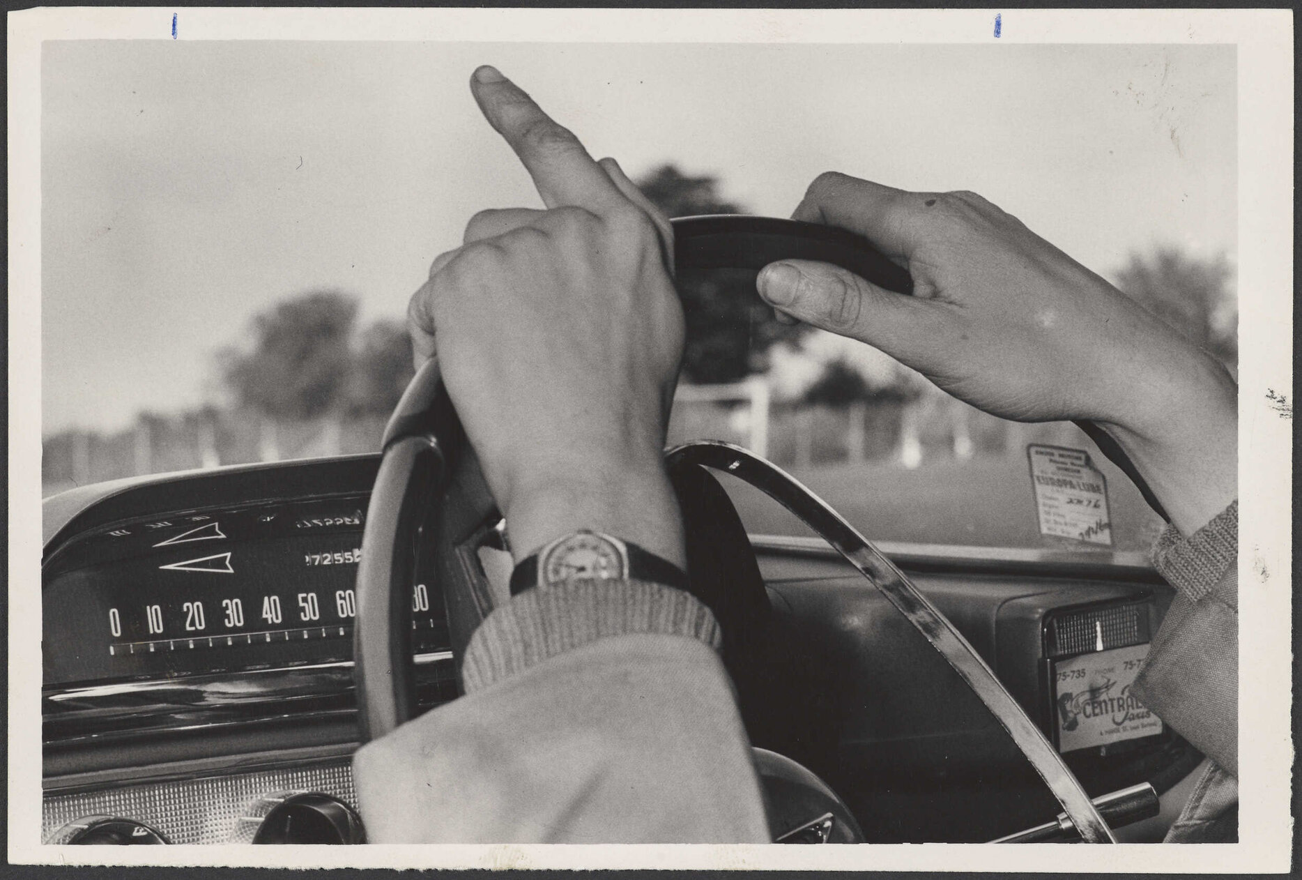 Hands on a steering wheel
