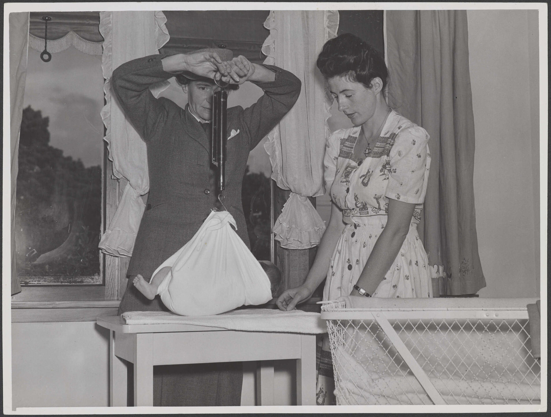 Baby being weighed