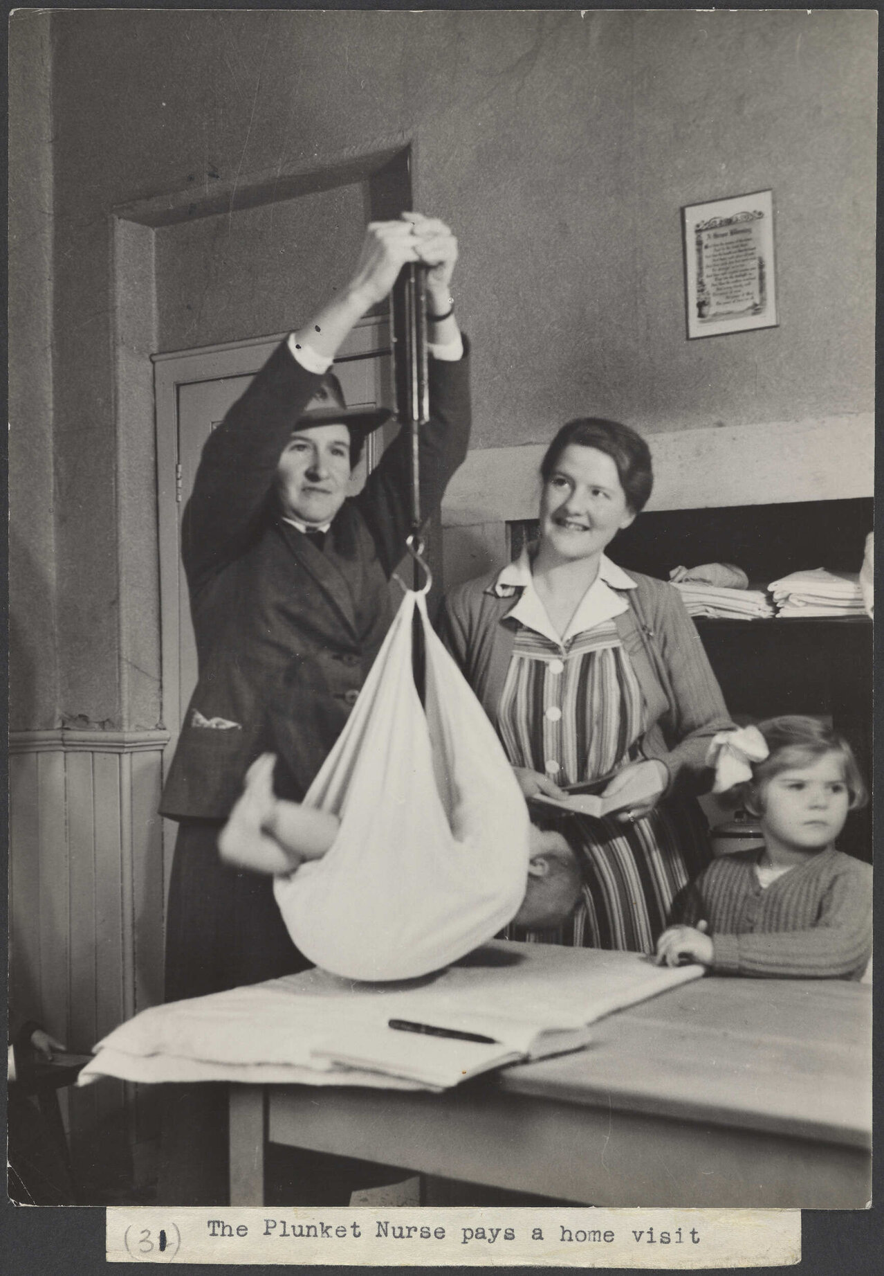 Baby being weighed