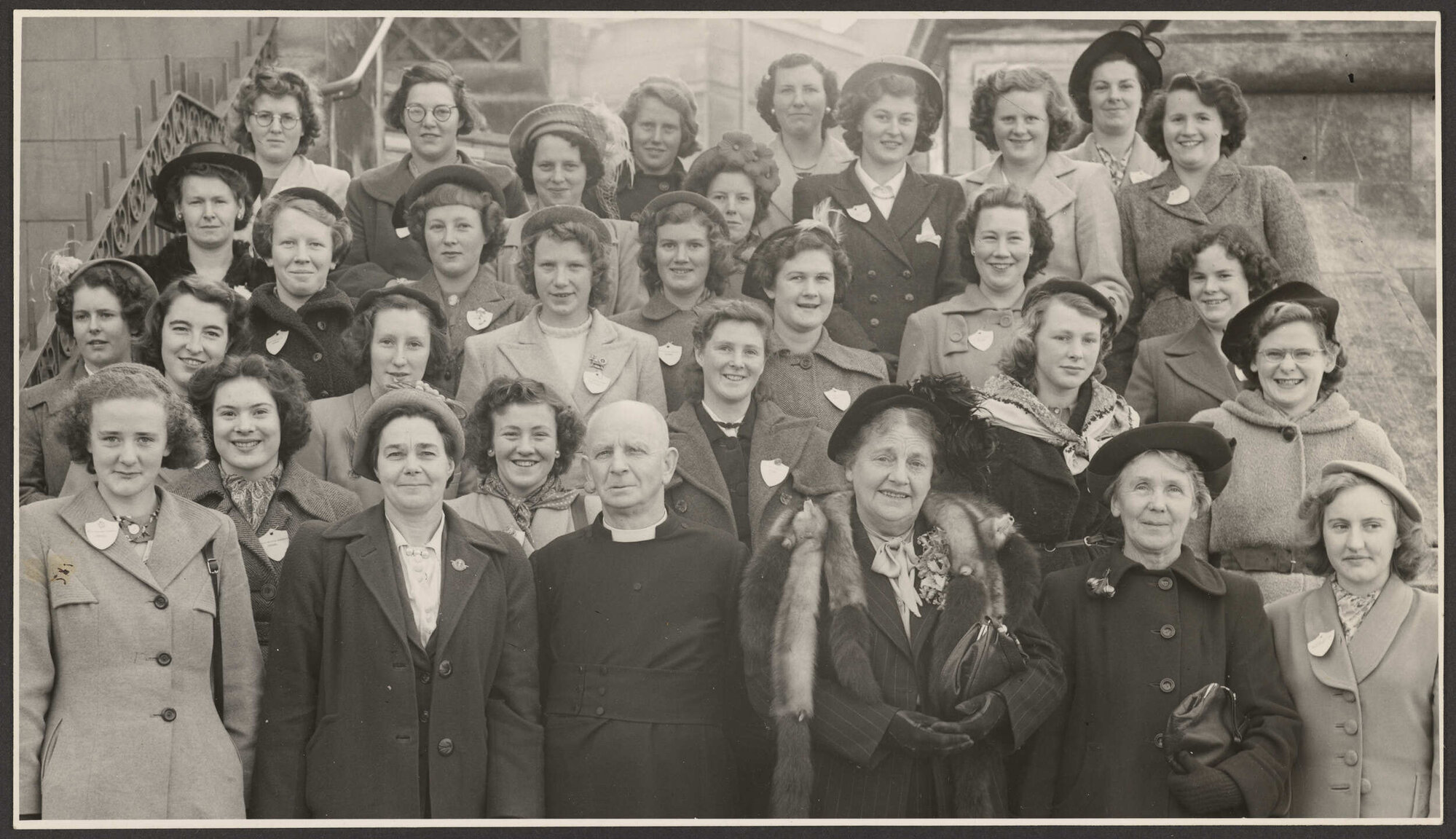 Members of the Women's Division of Federated Farmers and unidentified man in front of St Paul's Cathedral, Dunedin
