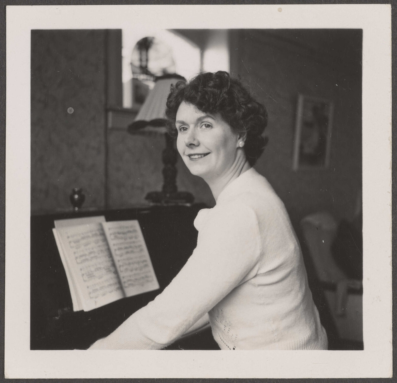 Brenda Shore sitting at a piano