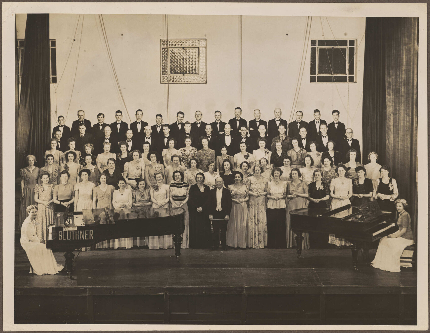 Choir on stage [Leech Lyric Choir?]