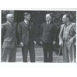 College principal and other officials outside