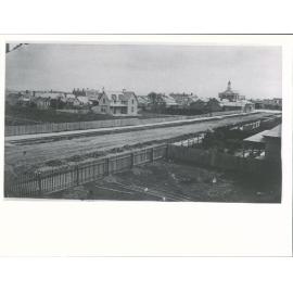 W. A. Mairs house in foreground, formerly  occupied by the Provincial Superintendent