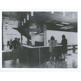 Circulation Desk  Seated behind at left to right Alison Hercus Denise McFarlane, Mar -Jo Donnelly.