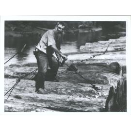 Joe Rauner, boring holes for raft making