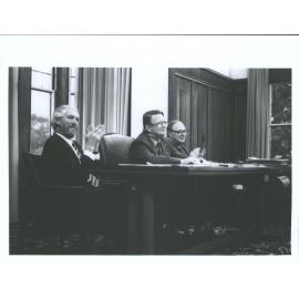 Senate Meeting Alan Musgrave, Sir Robin Irvine, Douglas Girvan (Registrar).  Sir Robin Irvine attends his last Senate meeting as