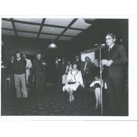 Arnold Perry Room Opening John Perry speaks, his wife watches, leaning on bar  Assoc. R of. J. F. Gwynne (chair Of Appeal Com) c