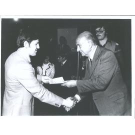 Opening of Arnold Perry Room.  Chancellor presents Blues certificate