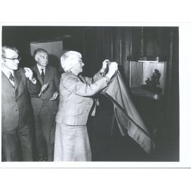 Opening of Arnold Perry Room,   Mr  Arnold Perry unveils sculpture given by Perry family watched by John Perry (son) & J. S. Som