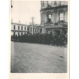Artillery marching past Howells, Dunedin