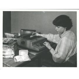 Children's Librarian at the Kapiti Library, Paraparaumu, Gail Clark cataloguing