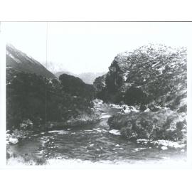 "Looking down a small gorge in the Greenstone Valley just above confluence of the High Burn - The cliff in centre of picture is