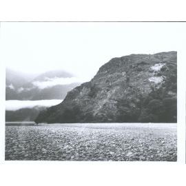 "The new road will run around this bluff - Part of Big Bluff looking towards The Haast Pass. Landsborough goes to left [and] Haa