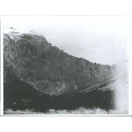 The saddle is 2000 feet above the figures in foreground, the waterfall to the left so about 3,500 feet high"