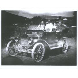 Ford car at Waitati in front of Kays House