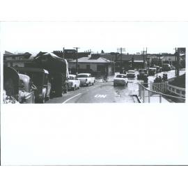 "Traffic made slow progress owing to waters at both approaches to Balclutha Bridge"