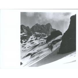 "Climbing up to the base camp at 15,500 ft, the expedition moves up the pass to the Barun. High above on both sides are tremendo