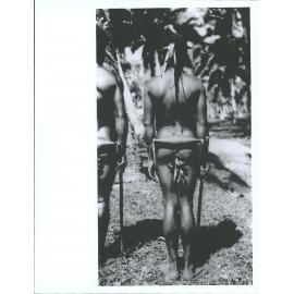 Espiritu Santo 'Men's dress in heathenism ... Lumps of wood at back, strings of native beads in front.'