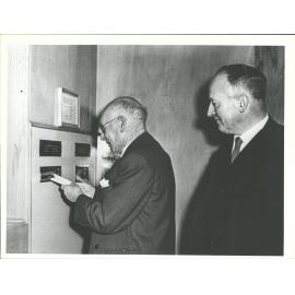 Mr Arthur Barnett posting first letter in Arthur Barnett's Ltd. Post Office with Mr Ted Kerr, Chief Postmaster.