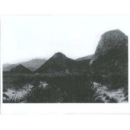 Kapuketereti Flat. The three pyramids and sphinx lying inland from wickliffe Bay and Papanui inlet, Otago Peninsula'