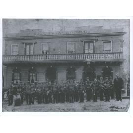 Tuapeka Brass Band outside Victoria Hotel, Peel Street