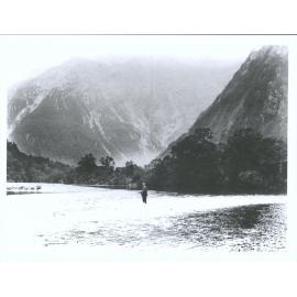 Unidentified man fishing in the Waiau River
