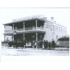 The old Wallace County Hotel. This hotel was burnt down down many years ago. Jas Steele is the driver of the coach.