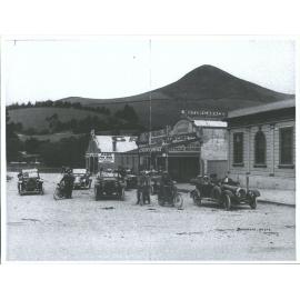 Motor Garage, and J.H. Milligan & Co., Clothiers