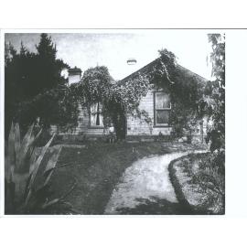 Unidentified Couple outside house