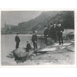 Mr S Luttrel viewing the site of new dock with some members of dock trust. Port Chalmers.