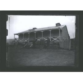 Two men and dog outside Shingle Creek Hotel