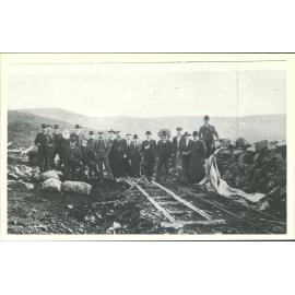 Group of directors & visitors at mouth of the drive