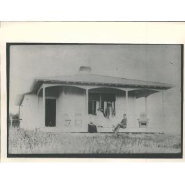 Unidentified group outside Warrington residence