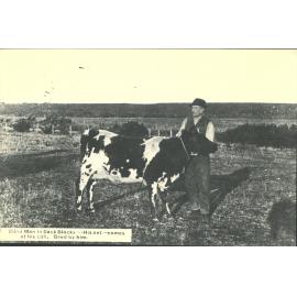 Blind man in back blocks. His pet, comes at his call. Bred by him