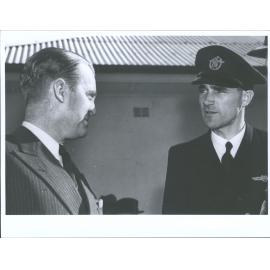 The Australian Minister for Air, Mr Fairbairn, talking to the Commander of the "Aotearoa" Captain Burgess