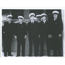 Pan American Airways, Captain E. Musick (far left)