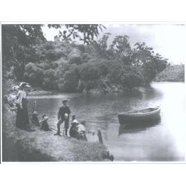 Woman and Children on the verge of a bay