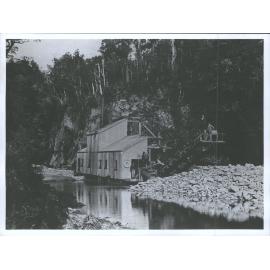 Men standing on dredge
