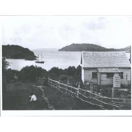 Children sitting outside unknown dwelling