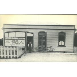 George Duncan outside bicycle shop he had in the Stirling Athenaeum
